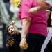 Natalie Harper pumps her fist in the air after the first pitch of the softball game on Saturday, May 4. Daniel Brenner I AnnArbor.com